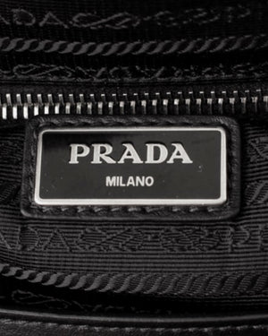 Prada enamel-logo Saffiano-leather mini pouch